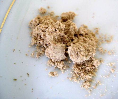 Amchoor powder, or dried mango powder. Sour and lovely in curries.